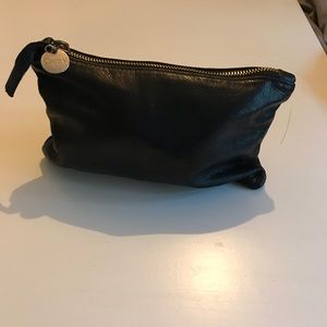 Clare v. Wallet clutch